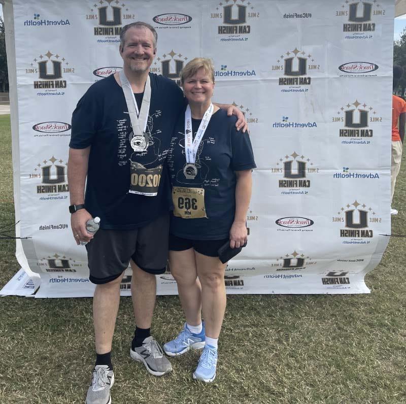 Roy and Kim Reid at a running event in 2021. (Photo courtesy of Roy Reid)